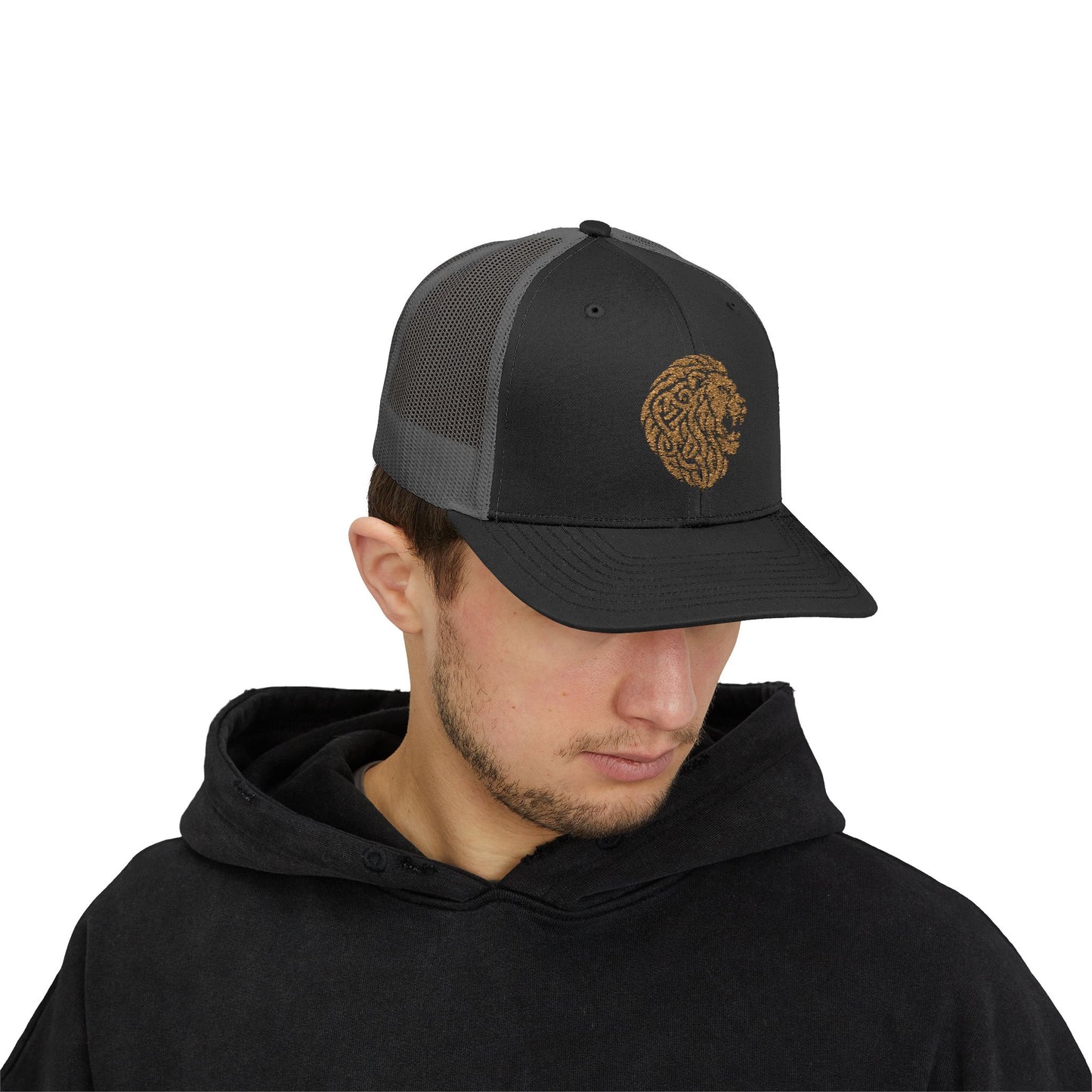 Black and Charcoal DK Lion Trucker Cap Doxa Kairos™ Hat Being Worn By a Man