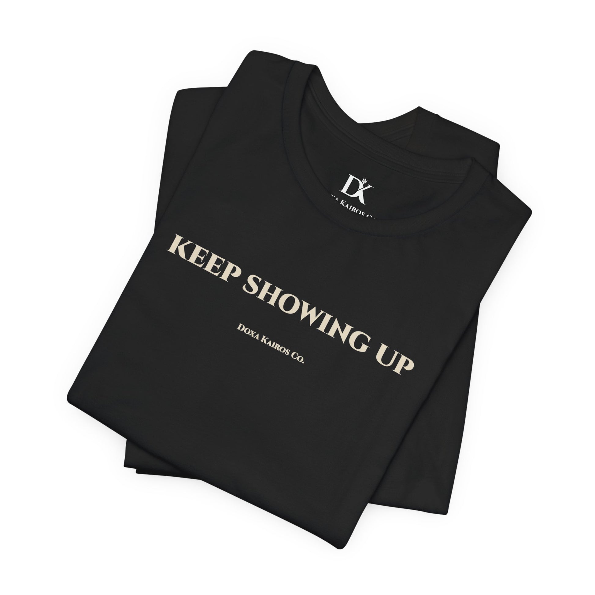 Folded Black Keep Showing Up Doxa Kairos™ T-Shirt